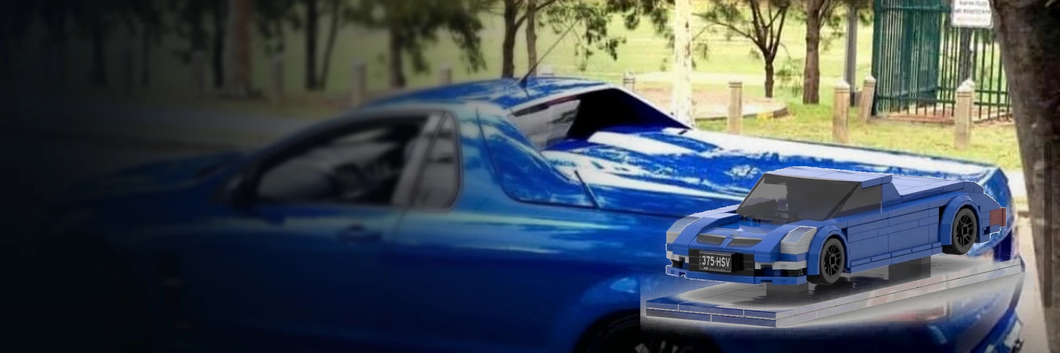 Real blue performance ute beside its custom brick keepsake model