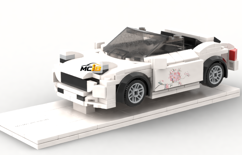 White open-top brick roadster preview with floral side panels on a white display base