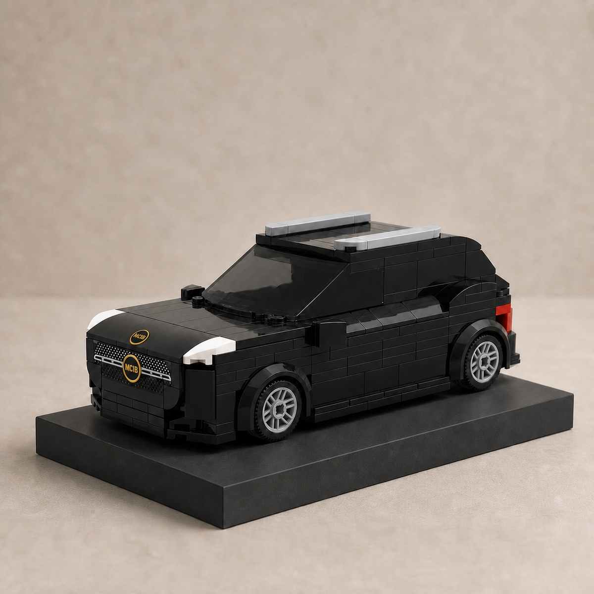 Square finished custom black SUV model with MCIB badges