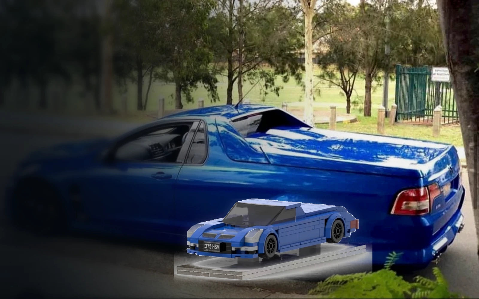 Real blue performance ute beside its custom brick keepsake model